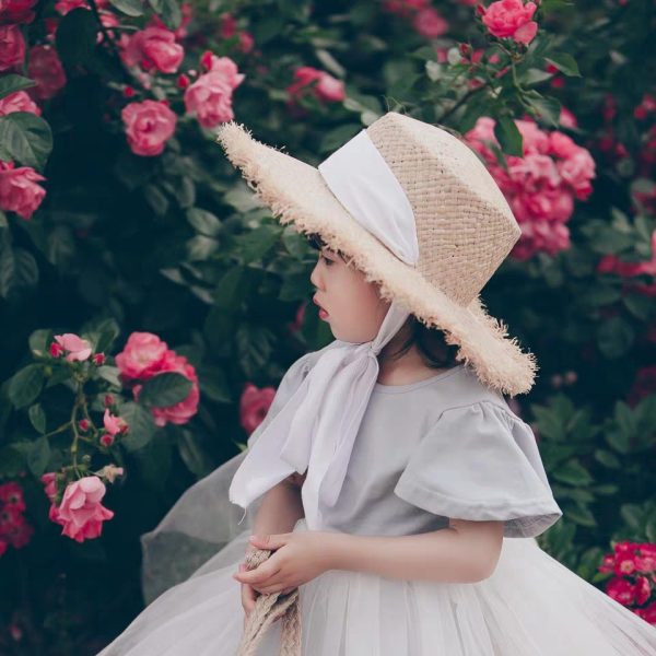 2023 Wholesale fashion Solid Color woven Straw Hat Kids Lace Strap Flat Top Sun Hat Big Brim Beach Straw Hat - Image 6